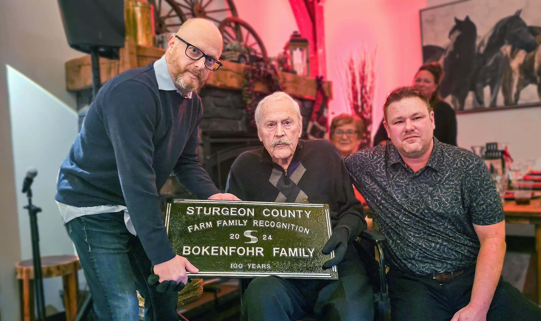 The Bokenfohr family receiving the Sturgeon County 100-Year Farm Family Recognition award at a private event.