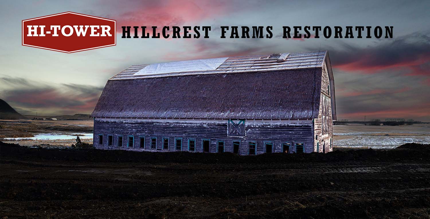 Hi-Tower’s restoration project at Hillcrest Farms, preserving a historic barn in a rural landscape.