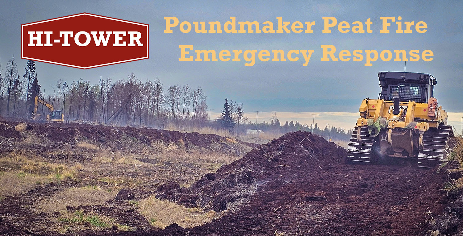 Hi-Tower heavy equipment working on containment and reclamation during the Poundmaker peat fire emergency response in west Edmonton, May 2025.
